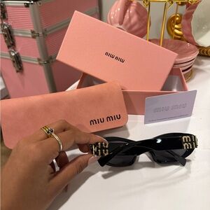 Miu Miu Cat Eye Black Sunglasses with Gold Accents